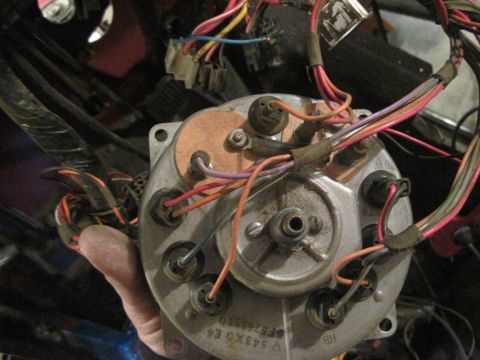 1985 Jeep CJ7 - A complex web of wires connects to the back of a vehicle's gauge cluster, suggesting a repair or modification is part of the dashboard asse…