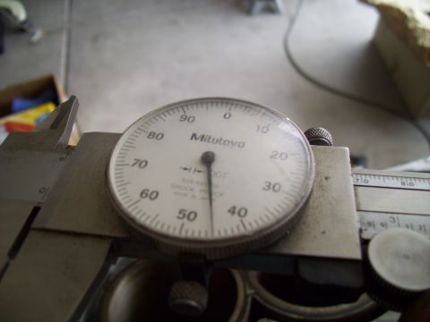 1995 Ford Probe - A Mitutoyo dial indicator is attached to a caliper, likely for precise measurement.