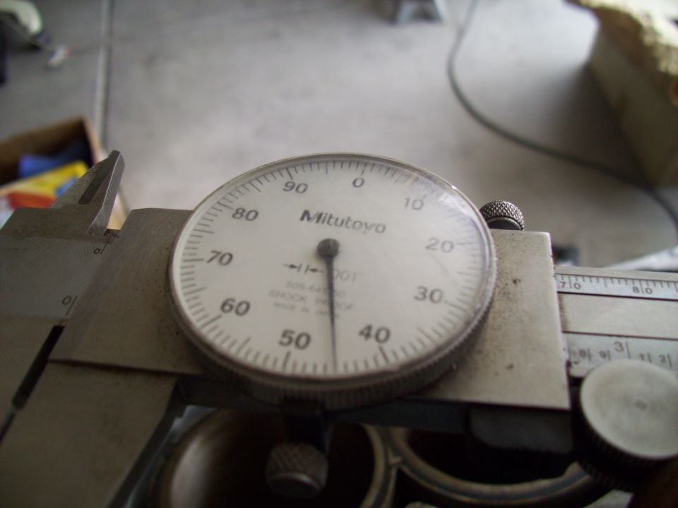 Dial indicator on a caliper measuring something