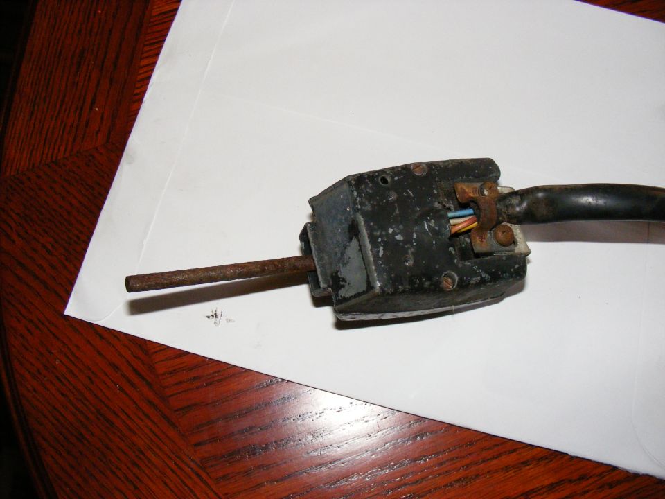 Old turn signal switch with rusty shaft and exposed wires