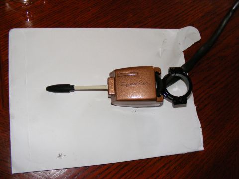 Copper-colored turn signal switch with black knob and mounting bracket