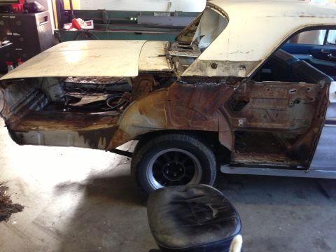 1964 Ford Fairlane - This 1964 Ford Fairlane shows significant rust damage to its rear quarter panel and interior structure.