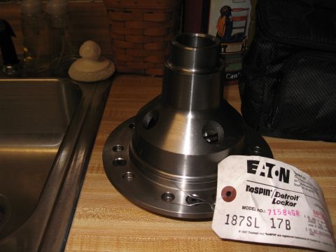 1994 Ford Bronco - A new Eaton Detroit Locker differential part sits on a countertop next to a sink.