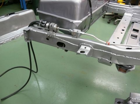 1976 Chevrolet Corvette - The chassis and fuel system components are visible in this close-up shot.