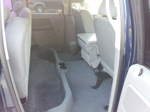 2007 Dodge 1500 - The interior of a vehicle is shown, focusing on the seating area and door.