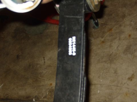 1985 Jeep CJ7 - Close-up of a leaf spring showing stamped part numbers.