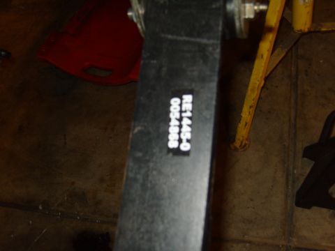 1985 Jeep CJ7 - A black part with a white label is shown in a garage setting.
