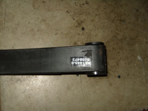 1985 Jeep CJ7 - A part with the text RE1445-0 0058473 is shown against a concrete surface.