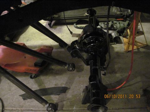 1985 Jeep CJ7 - Close-up view of a black rear axle assembly, likely undergoing maintenance or modification.