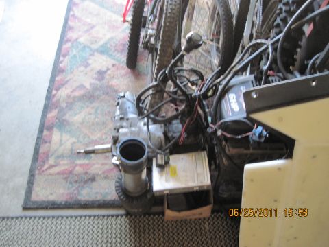 1985 Jeep CJ7 - Transmission and engine components are laid out on a rug, with a date stamp visible in the lower right corner.