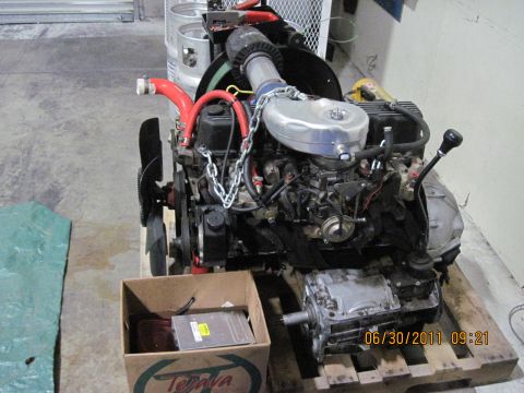 1985 Jeep CJ7 - Engine and transmission assembly shown on a pallet with a date stamp of 06/30/2011.