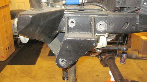 1985 Jeep CJ7 - Custom frame modification on a Jeep CJ, with a Coors Light can hanging nearby.