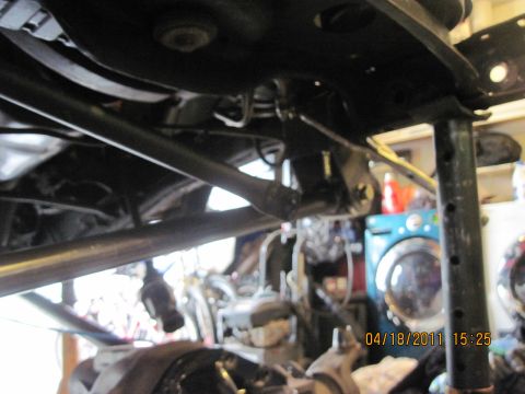 1985 Jeep CJ7 - Close-up view of the undercarriage, showing suspension and frame elements, with a date stamp of 04/18/2011.