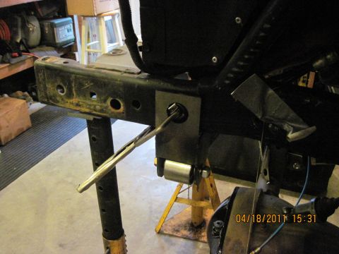 1985 Jeep CJ7 - Close-up of a Jeep CJ frame component, showing a jack and a metal bracket. Date stamp visible.