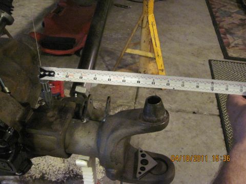 1985 Jeep CJ7 - A tape measure is used to measure a vehicle's axle housing, with a timestamp of 04/18/2011 visible.