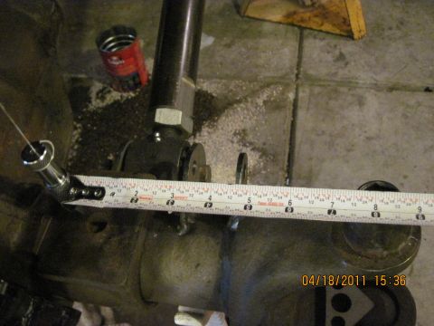 1985 Jeep CJ7 - Measuring a vehicle axle housing with a tape measure. Date stamp shows 04/18/2011.