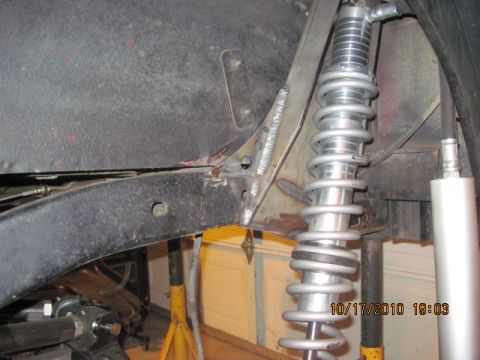 1985 Jeep CJ7 - Custom suspension work is visible on this vehicle's frame, a coilover shock.