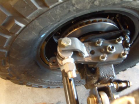 1985 Jeep CJ7 - Front axle and brake assembly detail on a Jeep CJ.