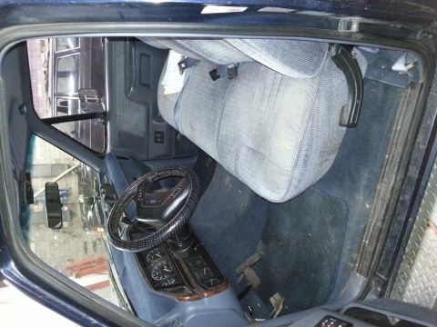 1989 Ford F-150 - Interior view of a 1989 Ford F-150, showing the dashboard, steering wheel, and seats.