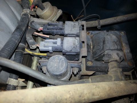 1989 Ford F-150 - Ford ignition coil pack and associated wiring connectors are shown in detail.