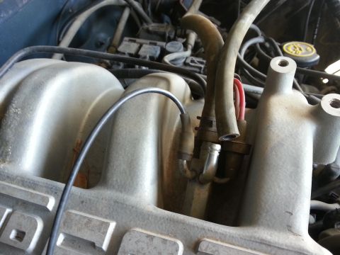 1989 Ford F-150 - Engine compartment detail showing intake manifold and hoses, with Supermotors branding.