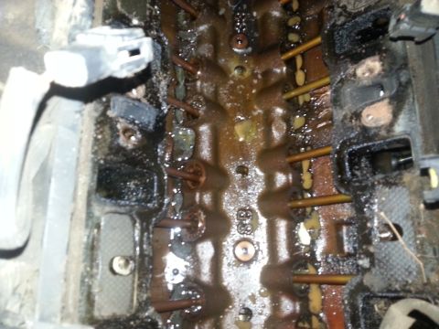 1989 Ford F-150 - This image shows a heavily soiled engine block, obscuring any specific year or model identification.