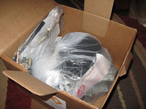 1981 Ford Bronco - A Holley 80555 carburetor kit is shown packaged in its original cardboard box, ready for installation.