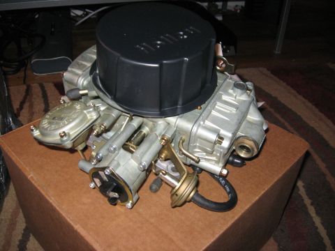 1981 Ford Bronco - Holley carburetor with black air cleaner lid, part number visible on lid.