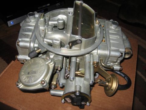1981 Ford Bronco - A detailed view of a Holley carburetor, a key component for internal combustion engines.