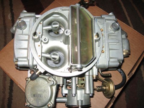 1981 Ford Bronco - Close-up of a Holley carburetor, part number "1258" visible on a circular plate.