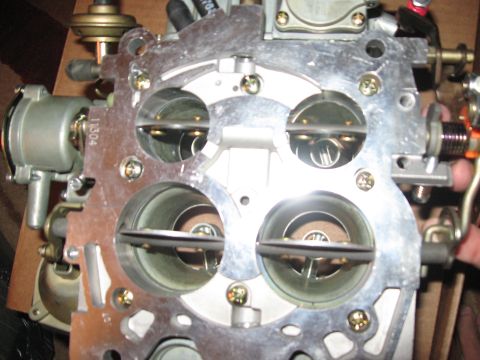 1981 Ford Bronco - This is a close-up view of a Holley carburetor, showing its internal components and throttle plates.