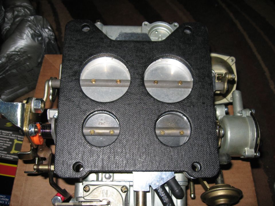 Holley 4-barrel carburetor with four throttle plates visible