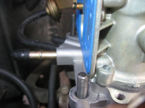 1981 Ford Bronco - Close-up of a carburetor component, likely for engine repair or modification.