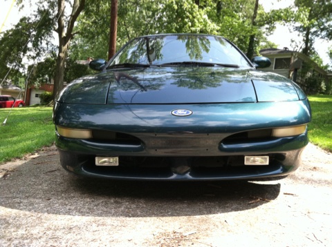1997 Ford Probe - A 1997 Ford Probe is shown from the front, parked outdoors on a sunny day.