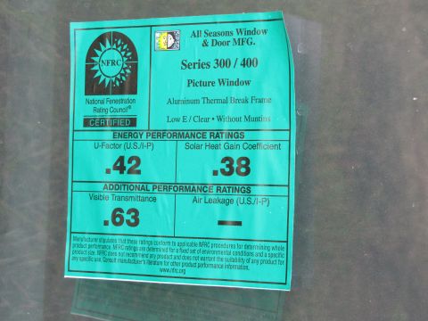 1995 Ford Bronco - This label details the U-Factor, Solar Heat Gain Coefficient, Visible Transmittance, and Air Leakage ratings for a window.