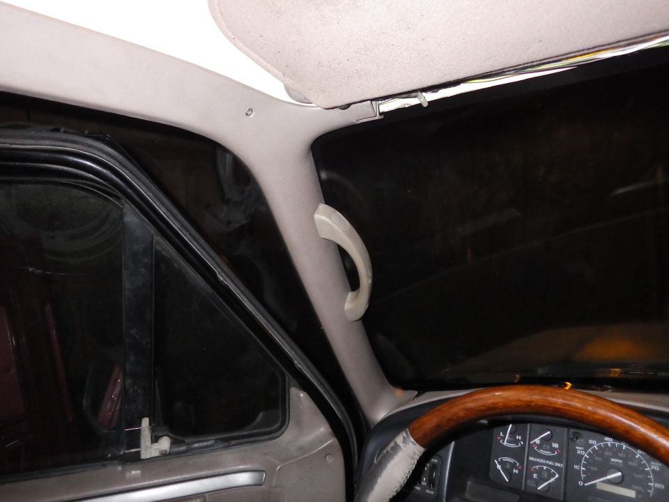 This passenger-assist handle took more time than I thought (because my first bracket design was wrong), but it was easier than I expected to get the position right.  I can't remember what the handle came from, but based on the bolts, I think it was a GM truck.

I'm adding comfort handles above the doors.  They probably won't be strong enough for climbing in since they use plastic mounts to stand off for the headliner, but no one expects an assist handle there, anyway.