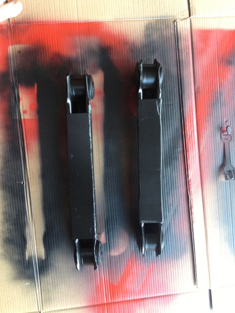 2005 Jeep Wrangler - Pair of control arms, likely for suspension work, shown after being painted.