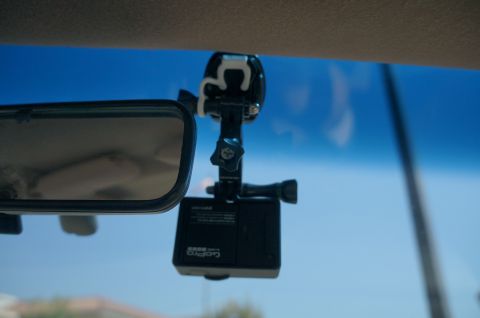 1995 Ford Taurus - GoPro camera mounted on windshield with a clear blue sky in the background.