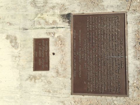 1986 Ford Bronco - Historical markers on a concrete wall, one detailing the Mojave Road and the other a dedication from 1986.