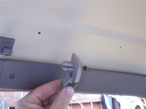 1983 Ford Bronco - Only the wide tip of the base goes through the sheet metal - the tiny stops are barely visible that provide standoff for a headliner. I car…