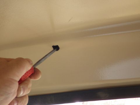 1983 Ford Bronco - After drilling slightly smaller than the square, finish the hole to size & deburr it with a square file.
