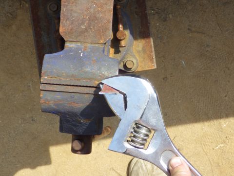 1983 Ford Bronco - To mimic the lump for the upper bolt, I started with a scrap of ~14ga steel and twisted it in a vise. Hammering on the wrench keeps the ben…