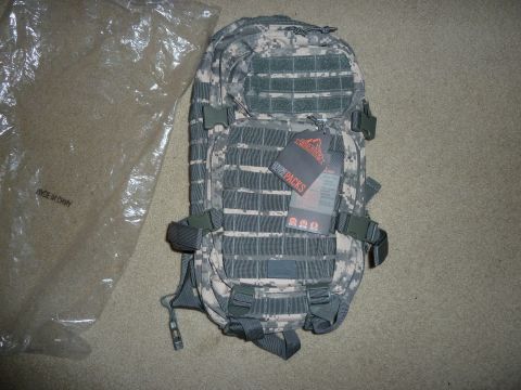 1992 Ford Mustang - A digital camouflage backpack is shown with its tag attached. The bag appears to be new and in packaging.