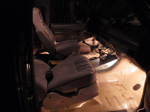 1983 Ford Bronco - They're not permanently mounted yet, but the underdash courtesy lights work well. The camera makes them look much brighter than they are.