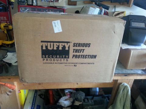 1992 Ford Bronco - A Tuffy Security Products box is shown, labeled for lockable automotive storage compartments.