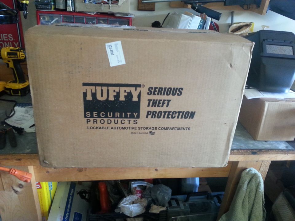 Cardboard box with Tuffy Security Products logo and text 'SERIOUS THEFT PROTECTION'