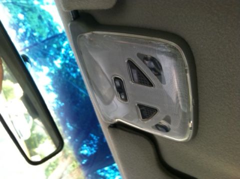 1997 Ford Probe - The interior overhead console features map lights and control buttons.