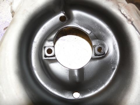 1976 Chevrolet Corvette - This is a close-up view of a metal automotive component, likely part of the suspension or braking system.