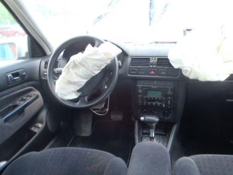 2002 Volkswagen Jetta - Interior view of a 2002 Volkswagen Jetta with deployed airbags.