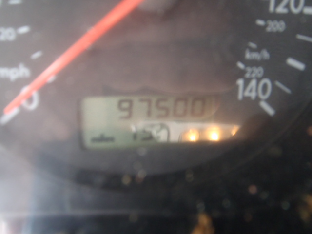 Odometer shows 97500 miles. Speedometer shows 140 km/h